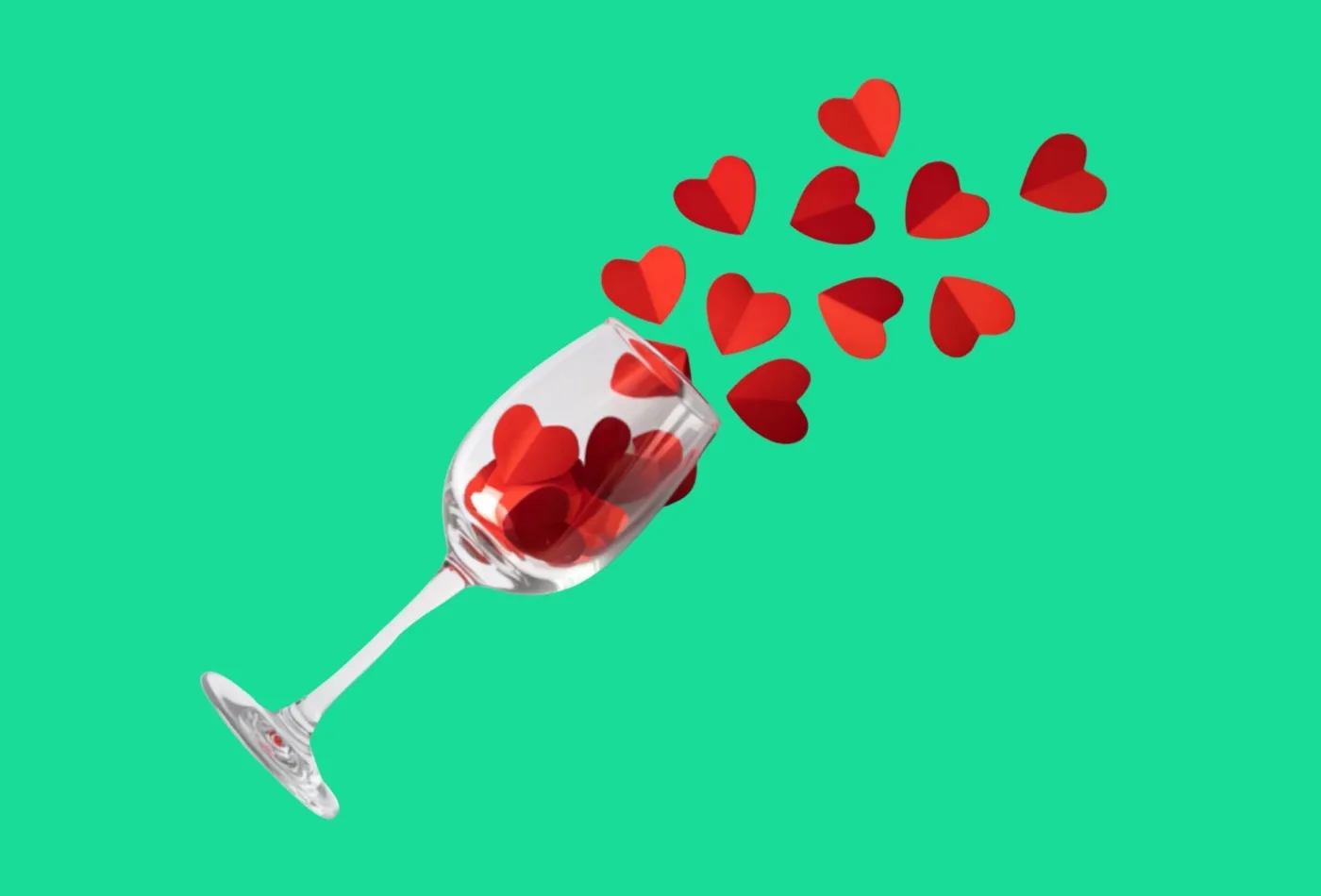 Verre de vin incliné d’où s’envolent des cœurs rouges, pour illustrer l’effet des émotions amoureuses sur la dégustation du vin.